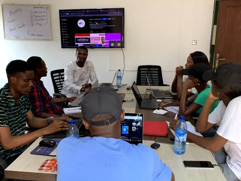 Students learning practical data analysis skills at a top school in Lagos